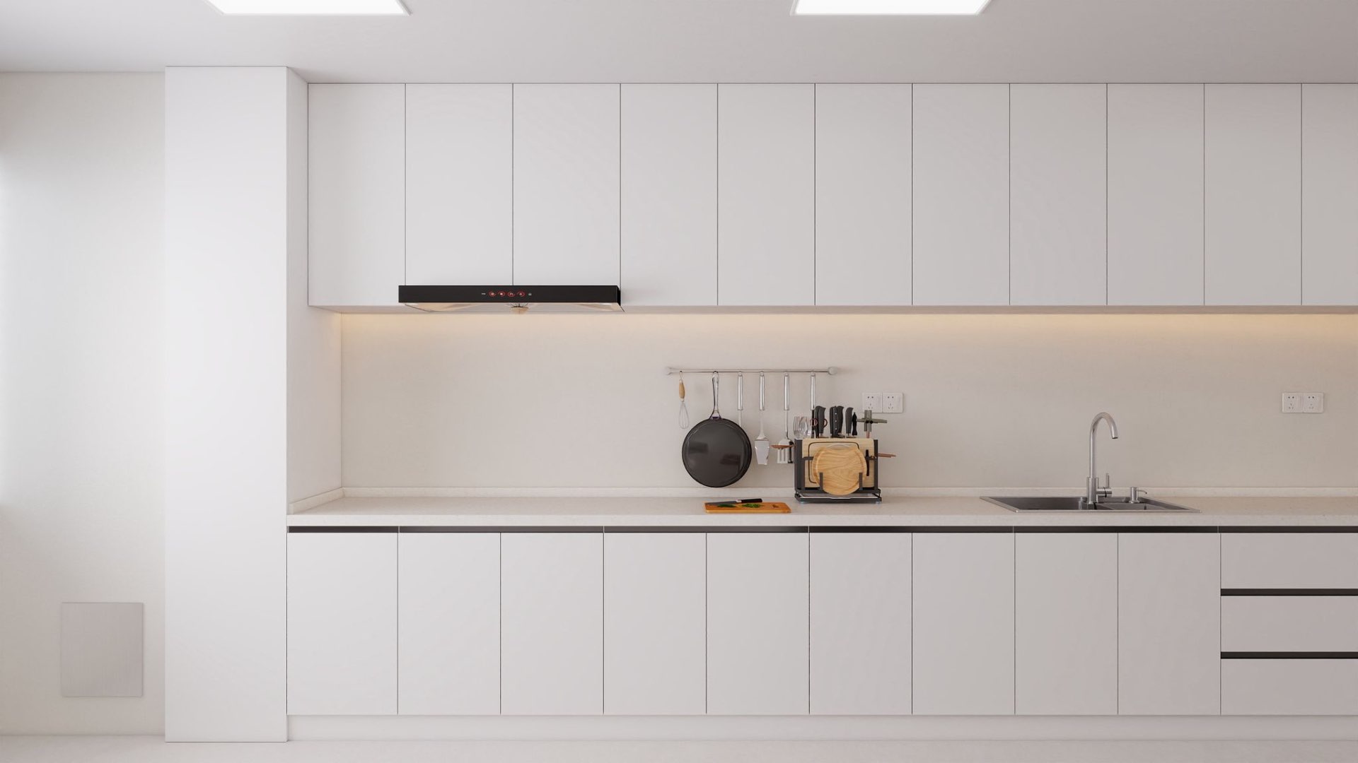Kitchen — full white galley with hood & sink